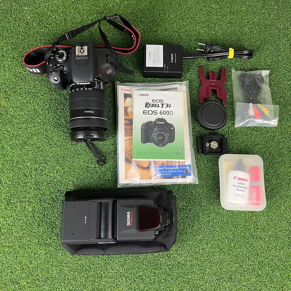 Canon EOS Rebel T3i DSLR Camera Bundle with EF-S 18-135mm IS Lens & Sigma Flash